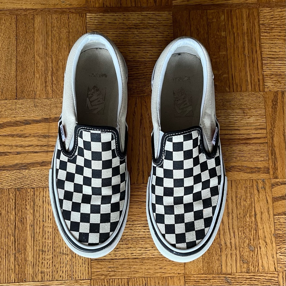 Vans - black & white checkerboard slip-ons
